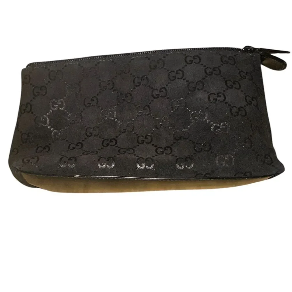 Gucci Textured Black velvet pouch.